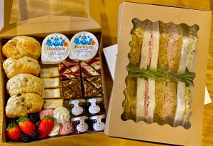 a box filled with different types of food on a table