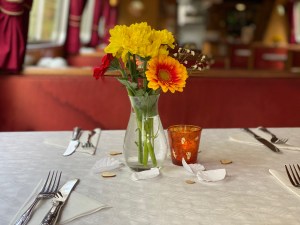 a vase of flowers on a table